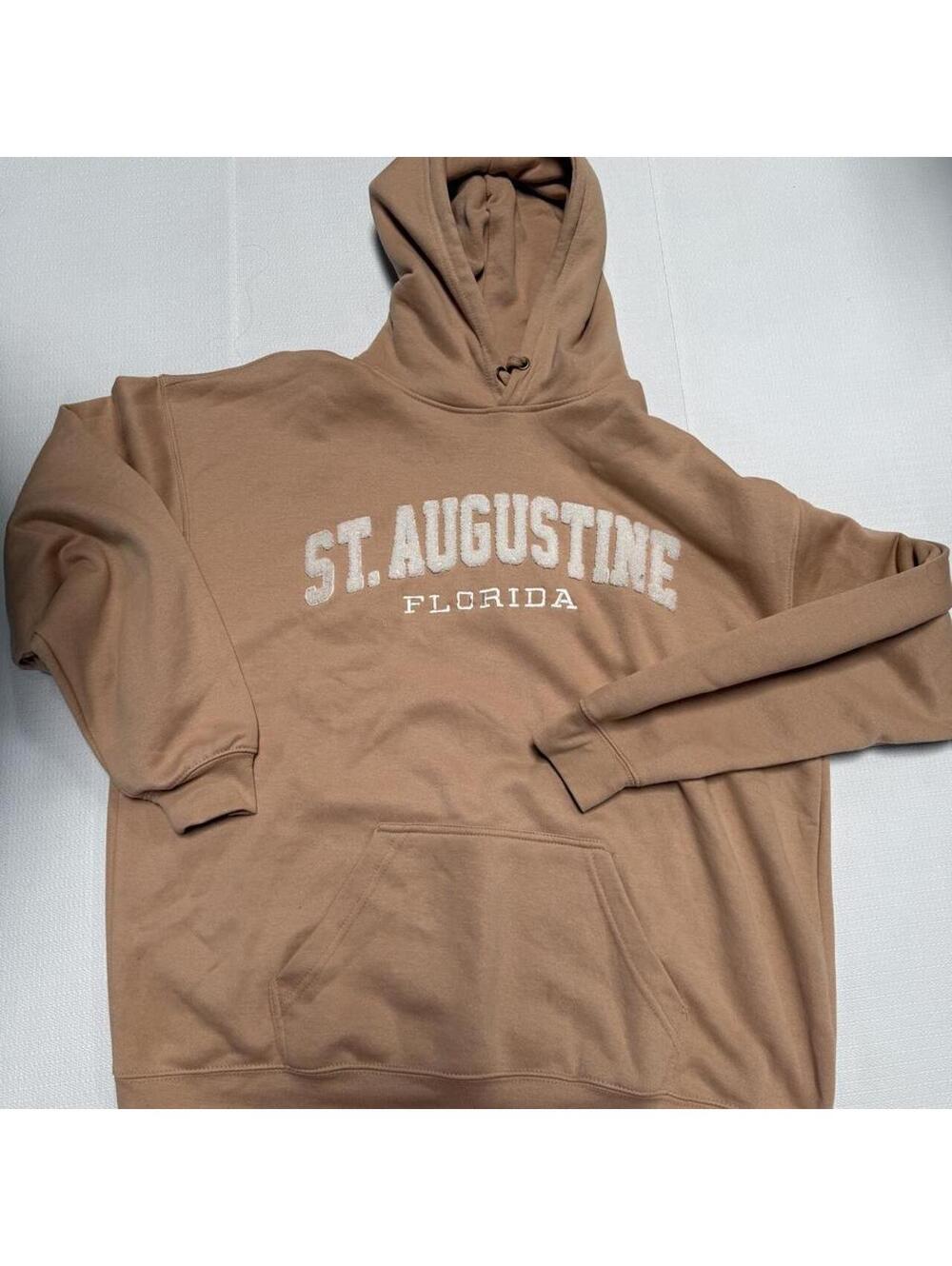 Tan St. Augustine Florida hoodie with white text reading 'ST. AUGUSTINE FLORIDA'